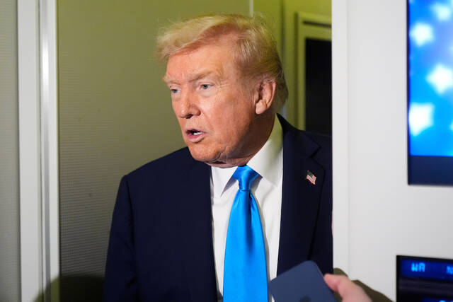 131883166_web1_131883166-24b93c04657c4d0282194de784cbb2f1 
			
				                                President Donald Trump speaks with reporters aboard Air Force One at Al Udeid Air Base in Doha, Qatar, on Saturday.
                                 AP Photo