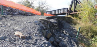 
			
				                                Erosion inching toward part of the Wyoming Valley Levee system flood wall along Riverside Drive in Wilkes-Barre prompted the Luzerne County Flood Protection Authority to approve a surveying assessment Thursday. The flood wall is behind the orange netting.
                                 Jennifer Learn-Andes | Times Leader

			
		