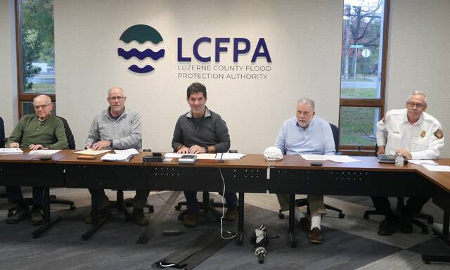 <p>Luzerne County’s Flood Protection Authority held a special meeting Thursday to unanimously approve the first step in fixing erosion creeping toward part of the Wyoming Valley Levee system flood wall along Riverside Drive in Wilkes-Barre. The authority board members, from left: John Maday, Vice Chairman William Hardwick, Chairman Dominic Yannuzzi, Coray Mitchell and Wilkes-Barre Fire Chief Jay Delaney.</p>
                                 <p>Jennifer Learn-Andes | Times Leader</p>