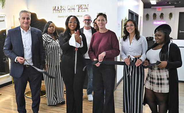 131898719_web1_Hair-at-Ten-Ribbon-cutting-1
Hair on Ten - Beauty salon by Teniequa is officially opened at 49 Broad St., Pittston. A ribbon-cutting ceremony was held on Thursday. From left: City of Pittston Mayor Michael Lombardo; Abby Plunkett; owner Teniequa Bryan; James Lynott; Howrasha Bryan, Mary Kroptavich, Pittston Main Street manager, Jamie Echevarria, and Niante Mungin.
Tony Callaio | For Sunday Dispatch