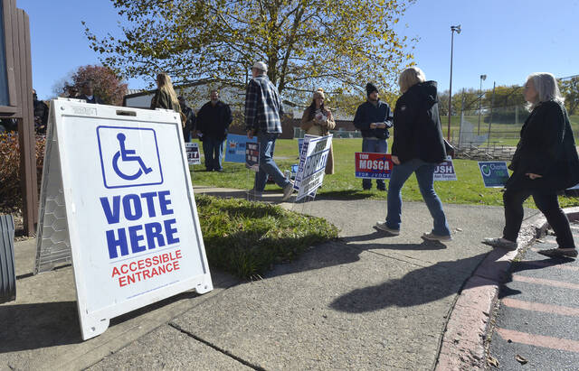 131910101_web1_Pic-1
Voters arrive at the Kingston Recreation Center on Tuesday.
Mark Moran | For Times Leader