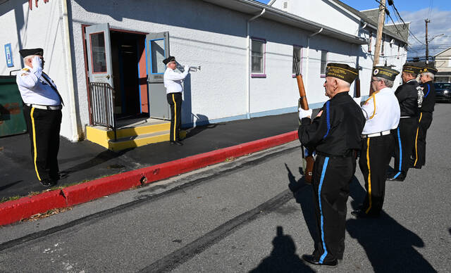 131916251_web1_Dupont-VFW-Vets-Day-4
Dupont AMVETS 189 Honor Guard stand at attention during Taps outside the VFW 4909 home during the 2024 Veterans Day event.
Tony Callaio file photo | For Sunday Dispatch
