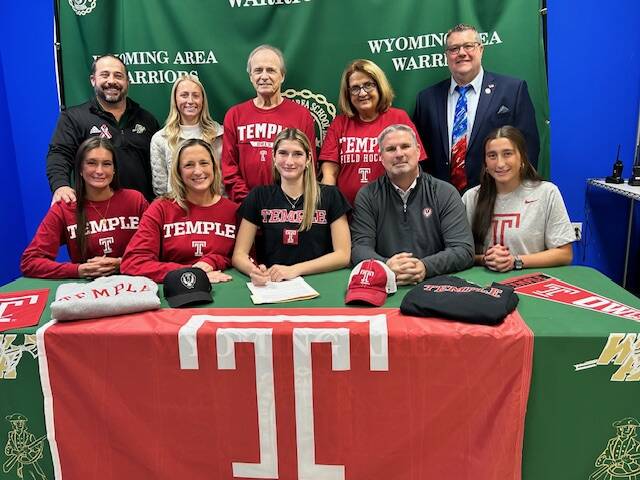 131932774_web1_IMG_8406
Wyoming Areas Lucia Campenni signed her NCAA Division I Letter of Intent this week to play field hockey at Temple University. From left, first row: Samara Campenni, sister; Chrissy Campenni, mother; Lucia Campenni; Tom Campenni, father; and Ella Campenni, sister. Second row: Joe Pizano, Wyoming Area athletic director; Bree Bednarski, head coach; Sam Mantione, grandfather; Josie Mantione, grandmother; and Jon Pollard, superintendent.
Submitted Photo