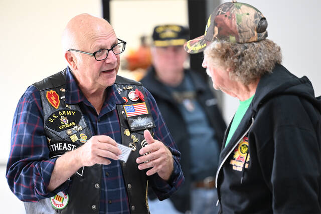 <p>Ronald J. Skamanich, left, chats with fellow veteran Bob Lopato prior to the lunch honoring veterans and EMS workers at Holy Mother of Sorrows Church hall.</p>
<p>Tony Callaio | For Sunday Dispatch</p>