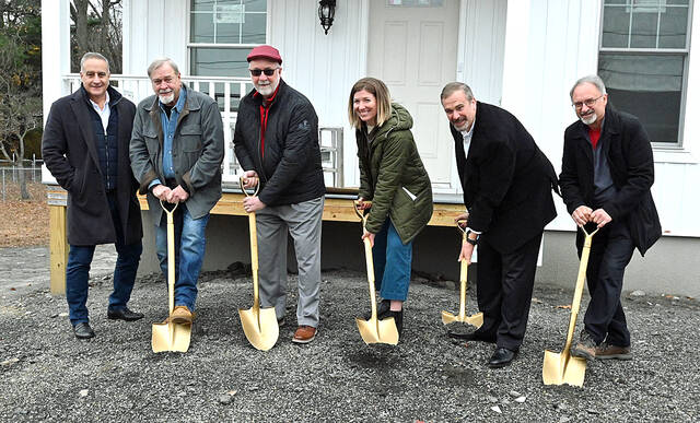 <p>Ground was broken at 292 Coolidge St., Dupont, on Wednesday, Nov. 12, by the Northeast Pennsylvania Land Bank (NEPALB) and Cornerstone Building Solutions Inc. for a rent-to-own house owned by NEPALB. From left: City of Pittston Mayor Michael Lombardo, Stanley Knick, NEPALB board member and Dupont Borough councilman; Bob Linskey, NEPALB board member and Jenkins Twp. Supervisor; Shannon Bonacci, NEPALB deputy director; Joe Chacke, NEPALB executive director; and Dave Rzeszewski, Cornerstone Building Solutions Inc.</p>
<p>Tony Callaio | For Sunday Dispatch</p>