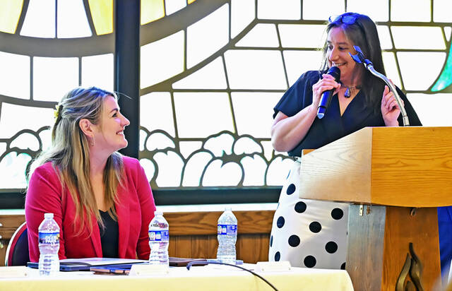 <p>Greater Pittston Chamber of Commerce President Michelle Mikitish, right, has a light moment with WVIA’s President & CEO Carla McCabe, left, as Mikitish wrapped up the annual Autumn Breakfast. McCabe served as the featured speaker of the breakfast at St. Joseph Marello Parish Hall on Friday.</p>
<p>Tony Callaio | For Sunday Dispatch</p>
