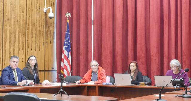 131953397_web1_electcert1
Luzerne Countys Election Board certified the Nov. 4 general election results Monday at the county courthouse in Wilkes-Barre. From left, are: county Assistant Solicitor Gene Molino, county Election Director Emily Cook, board member Daniel Schramm, board Vice Chairwoman Alyssa Fusaro and board Chairwoman Christine Boyle.
Jennifer Learn-Andes | Times Leader