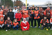 
			
				                                Players and volunteers for the Greater Pittston Santa Squad Turkey Bowl touch football game at Charley Trippi Stadium paused for a photo after the game.
                                 Tony Callaio | For Sunday Dispatch

			
		