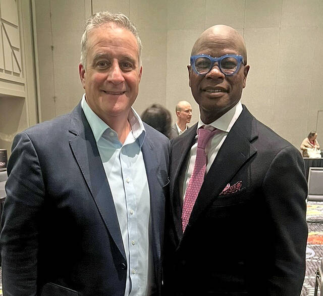 131964145_web1_Lombardo-NLC-Board
City of Pittston Mayor Michael Lombardo was elected to a one-year term on the National League of Cities (NLC) while attending a NLC national summit in Salt Lake City, Utah, this month. Lombardo, left, stands with the NLC CEO & Executive Director Clarence E. Anthony, while at the summit.
Submitted photo