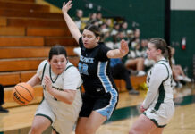 GIRLS BASKETBALL ROUNDUP: Wyoming Area, Pittston Area use late pushes to pull out wins
Warrior Anna Kelleher (24), right, sets a pick against Wilkes-Barre Areas Alyssa Thebeault (32) for Warrior Londyn Sobeck (33).
Tony Callaio | For Sunday Dispatch