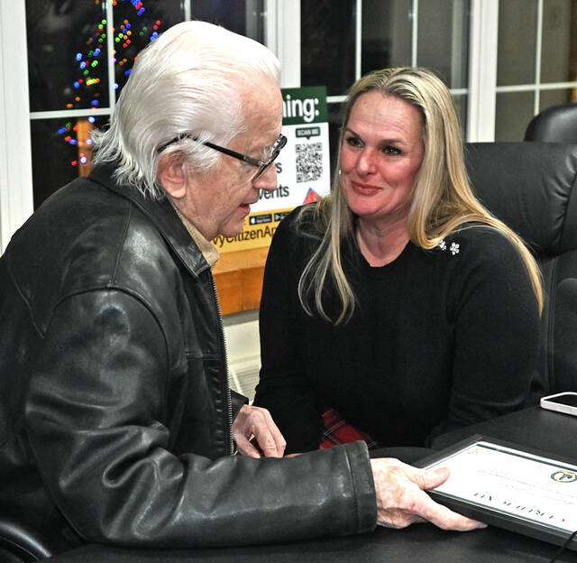 <p>Wyoming Borough Solicitor Atty. Laura Dennis chats with outgoing councilman John Lipsky at the end of the December council meeting.</p>
<p>Tony Callaio | For Sunday Dispatch</p>
