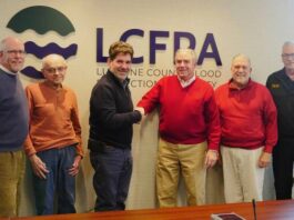 
			
				                                Luzerne County Flood Protection Authority Executive Director Christopher Belleman, fourth from left, is congratulated following Tuesdays meeting  the last before his Jan. 9 retirement. Authority Board members, from left, are: Vice Chairman William Hardwick, John Maday, Chairman Dominic Yannuzzi, Coray Mitchell and Jay Delaney.
                                 Jennifer Learn-Andes | Times Leader

			
		