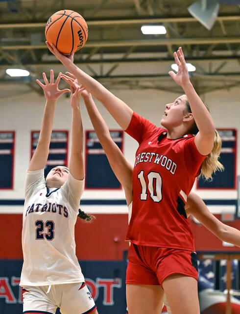 <p>Crestwood’s Charlie Hiller (10) grabs a rebound from Pittston Area’s Arianna McGarry (23) in first half action.</p>
<p>Tony Callaio | For Times Leader</p>