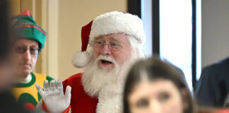 
			
				                                Santa Claus arrived in style aboard a Jenkins Twp. fire truck at the fire company hall on Sunday, Dec. 14, for the annual township Christmas celebration.
                                 Tony Callaio | For Sunday Dispatch

			
		