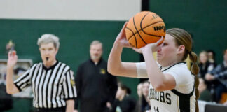 
			
				                                Veteran PIAA official and Luzerne Co. Hall of Famer, Kathy Goeringer, indicates Warrior Jailyn Park is shooting a three-pointer, which was successful against MMI on Dec. 22 at home.
                                 Tony Callaio | For Sunday Dispatch

			
		