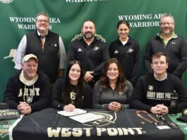 
			
				                                Wyoming Area recently held a signing ceremony to celebrate Taylor Gashis decision to accept her nomination to attend Army West Point and compete in track and field. From left, first row: Ed Gashi, father; Taylor Gashi; Lacy Gashi, mother; and Hunter Gashi, brother. Second row: Jon Pollard, superintendent; Joe Pizano, athletic director/head coach; Kristen Lombardo, assistant coach; and Greg Riley, principal.
                                 Submitted Photo

			
		