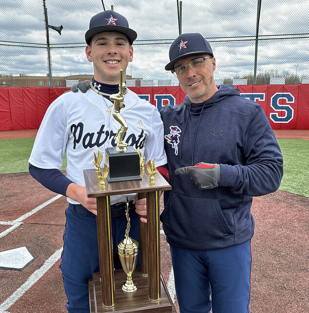 <p>Pittston Area pitcher Beau Widdick was selected and presented the Agolino MVP Trophy of the game against cross-town rival, Wyoming Area, on April 13. Patriot head coach Paul Zaffuto presented the trophy.</p>
<p>Tony Callaio file photo | For Sunday Dispatch</p>