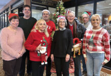 
			
				                                Jenkins Twp Lions Clubs annual Christmas visit to visit the residents of Wesley Village took place on Saturday, Dec. 13. From left, first row: Marlyn Querci, Marie Rovinski, Mary Jo Shillbeer, and Rachel Rovinski. Second row: Steven Vitek, Stan Rovinski, Tom Ruskey, and John Stuckus.
                                 Submitted photo

			
		