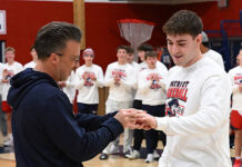 
			
				                                Pittston Area head baseball coach is shown placing a 2025 PIAA D2 5A Championship ring on graduate Silvio Giardina, who now plays varsity baseball at Lehigh University.
                                 Tony Callaio | For Sunday Dispatch

			
		