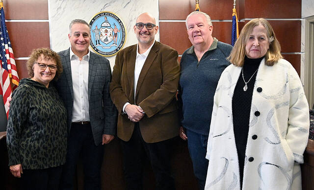132055223_web1_Pittston-2026-Swear-in-4
District Magistrate Alexandra Kokura Kravitz swore in City of Pittston officials on Monday, Jan. 5, in city council chambers. From left: Rosemary Frati, treasurer; Mayor Michael Lombardo; council members, Anthony Tony Guariglia, Kenneth Bangs, and MaryPat Melvin Scarantino.
Tony Callaio | For Sunday Dispatch