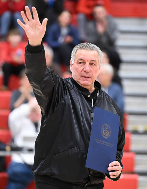<p>Pittston Area alumn Tony Usavage waves to the crowd after being acknowledged for his 50th year as a PIAA official before the Hazleton Area at Pittston Area girls basketball game on Thursday evening.</p>
<p>Tony Callaio | For Sunday Dispatch</p>