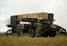 
			
				                                U.S. Army Sgt. Tamayo Ezekiel (left) and U.S. Army Pfc. Colby McCormick (right), Army Patriot Launching Station Enhanced Operators, raises the MIM-104 Patriot launching station Jul. 14, 2021, at Camp Growl in Queensland, Australia, during Exercise Talisman Sabre 2021. TS 21 supports the U.S. National Defense Strategy by enhancing our ability to protect the homeland and provide combat-credible forces to address the full range of potential security concerns in the Indo-Pacific.
                                 Courtesy of Tobyhanna Army Depot

			
		