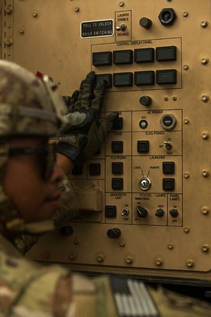 <p>U.S. Army Sgt. Tamayo Ezekiel, an Army Patriot Launching Station Enhanced Operator section chief, finds the MIM-104 Patriot address and turns on the missile heaters July 14, 2021, at Camp Growl in Queensland, Australia, during Exercise Talisman Sabre 2021. TS 21 supports the U.S. National Defense Strategy by enhancing our ability to protect the homeland and provide combat-credible forces to address the full range of potential security concerns in the Indo-Pacific. Ezekiel is a native of Anchorage, Alaska.</p>
<p>Courtesy of Tobyhanna Army Depot</p>