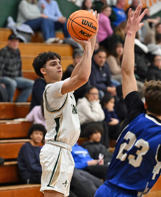 <p>Shane Pepe hits a 3-pointer for the Warriors in the first quarter against Hanover Area on Friday night.</p>
<p>Tony Callaio | For Sunday Dispatch</p>