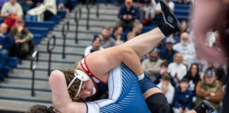 
			
				                                Noah Gruber of Pittston Area throws Abington Heights Dane Wheeler en route to a pin in the 285 pound match at Saturdays District 2 Class 3A Wrestling Duals championship.
                                 Buck Norton-Jennings | For Sunday Dispatch

			
		