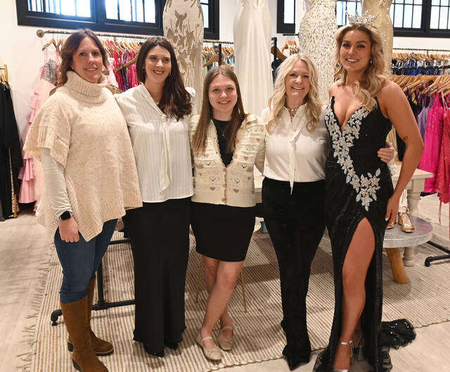 132102433_web1_Showroom56-3
Sally Van Scoy, owner of Showroom56 had her staff on hand as prom season approaches, when high school students begin their hunt for the proper gown. From left: Kim Sweeney, Jennifer Casey, Kayla Henkel, Van Scoy, and the reigning Miss Pennsylvania Victoria Vespico.
Tony Callaio | For Sunday Dispatch