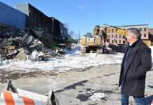 
			
				                                City of Pittston Mayor Michael Lombardo was on hand with heavy equipment, beginning to take down the former Quinns Supermarket off Kennedy Blvd. Lombardo points to the area where retail and a future grocery store will be located when the future four-story parkade will be erected.
                                 Tony Callaio | For Sunday Dispatch

			
		