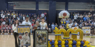 
			
				                                Cameron Parker was honored before Thursdays Old Forge game for scoring his 1,000th career point in the previous outing.
                                 Submitted Photo

			
		