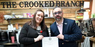 
			
				                                Leo Russo, a director of outreach for Rep. Rob Bresnahans office, presents a Certificate of Recognition prior to the ribbon-cutting ceremony held at The Crooked Branch.
                                 Tony Callaio | For Sunday Dispatch

			
		
