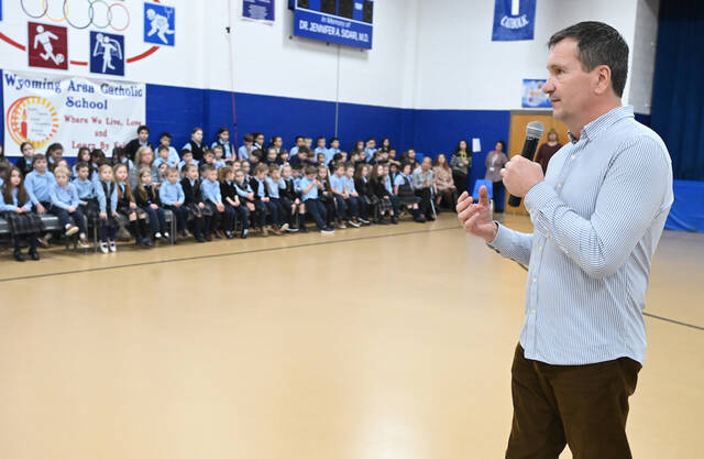 <p>Wyoming Area Catholic Class of 1980 representative Andy Vitek spoke to the students about the importance of kindness.</p>
<p>Tony Callaio | For Sunday Dispatch</p>
