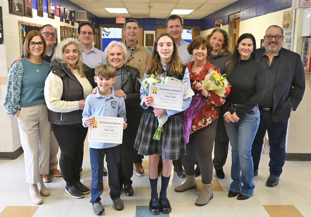 132151395_web1_WAC-1980-Kindness-Award-3
The three recipients of the Wyoming Area Catholic Class of 1980 Kindness Award stand in the front row before members of the Class of 80. Robert Svab, Victoria Sabetta, and Corinne Hudzinski hold flowers and award certificates.
Tony Callaio | For Sunday Dispatch