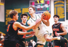 
			
				                                Wyoming Area forward Luke Kopetchny drives close to the basket as Tunkhannocks Bode Lukasavage defends in the first quarter.
                                 Fred Adams | For Sunday Dispatch

			
		