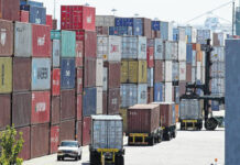 
			
				                                In this file photo, stacked containers wait to be loaded onto trucks at the Port of Oakland in Oakland, Calif.
                                 AP File Photo

			
		