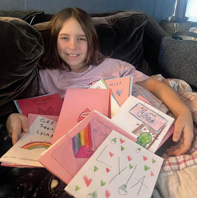 132167986_web1_Lyla-Seamans-2
While recovering from surgery at home, nine-year-old Lyla Seamans received plenty of love from her friends.
Submitted photo