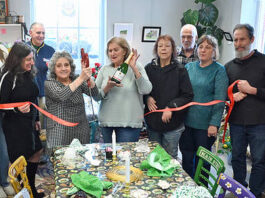 
			
				                                Tea & More owner/operator, Judy Passetti (with scissors), cuts the ribbon of the latest store at Downtown Pittston. Located on the first floor of the Reilly Building, Tea & More will serve breakfast and lunch items as well as an assortment of teas, caffeine-free teas, Polish teas, organic teas, and other beverages.
                                 Tony Callaio | For Sunday Dispatch

			
		