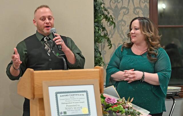 <p>Nico, left, and Ashley, right, had the honor of introducing their mother, Mary Rossi, the 2026 Distinguished Woman of the Year by the Greater Pittston Women’s Network at Fox Hill Country Club on Thursday evening.</p>
<p>Tony Callaio | For Sunday Dispatch</p>