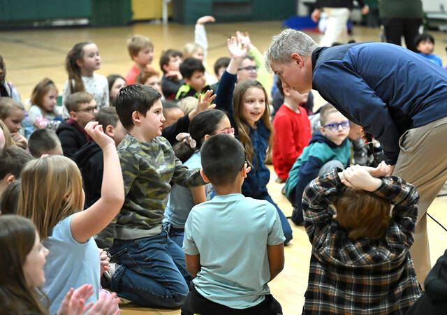 <p>Scranton/Wilkes-Barre RailRiders’ Communications Director Adam Marco, right, fields questions from Wyoming Area Primary Center second graders.</p>
<p>Tony Callaio | For Sunday Dispatch</p>