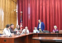
			
				                                Luzerne County Administrative Services Division Head Jim Rose, standing, welcomes Audrey Serniak back to the county Election Board before Wednesdays meeting. She was appointed to a vacant seat by County Council in January. Also shown, from left, are county: Deputy Election Director Steve Hahn; Deputy Election Chief Clerk Amanda Latoski; Assistant Solicitor Gene Molino; Election Director Emily Cook; and Election Board members Albert Schlosser, Chairwoman Christine Boyle, and Vice Chairman Rick Morelli.
                                 Jennifer Learn-Andes | Times Leader

			
		