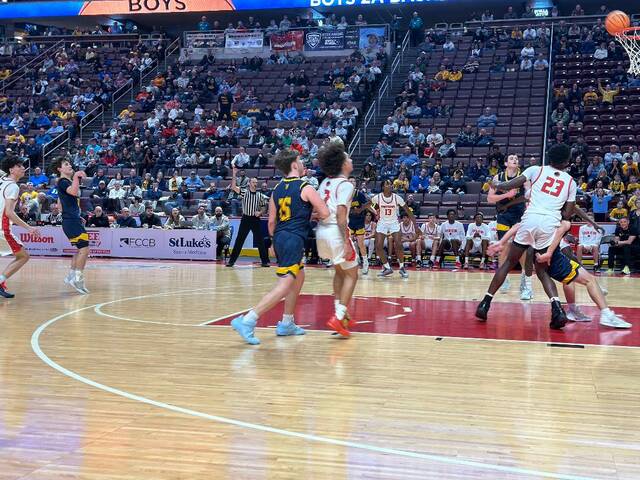 132215758_web1_Rebound
Old Forge had trouble containing 6-foot-8 Mamadou Kane (23) on the boards in Fridays state final loss to Sewickley Academy.
Tom Robinson | For Sunday Dispatch