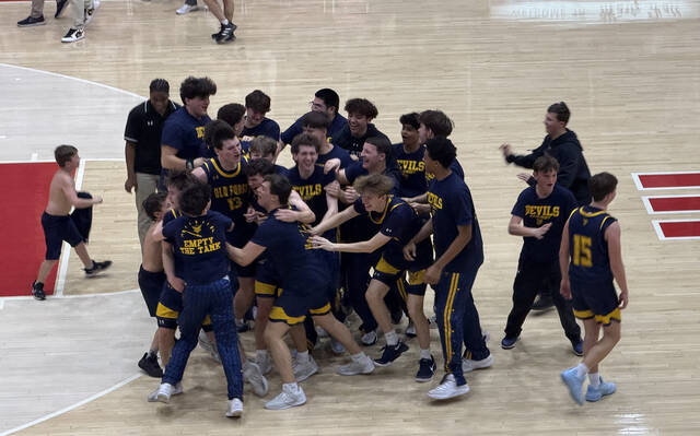 132215762_web1_IMG_8560
Old Forge players celebrate their come-from-behind victory in the state quarterfinals March 14 at Pottsvilles Martz Hall.
Tom Robinson | For Sunday Dispatch
