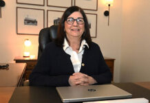 
			
				                                Duryea Mayor Trina Moss, the first elected female mayor of the borough since its incorporation in 1901, sits in her office at the Duryea Borough Building. Moss, a lifelong resident of Duryea, is in the first few months of her term and is looking forward to rolling up her sleeves to move Duryea forward.
                                 Tony Callaio | For Sunday Dispatch

			
		