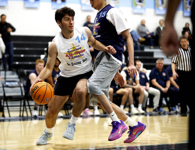 132233763_web1_boys1_faa
Bruno Pizzano (Wyoming Area) Team Macario works inside as Ayden Agapito (Crestwood) Team Belenski guards.
Fred Adams | For Times Leader