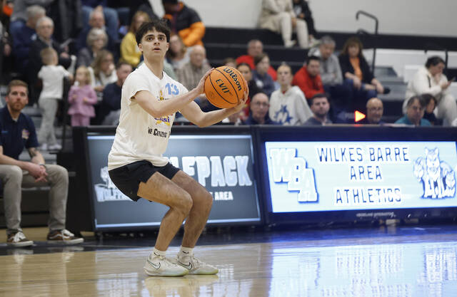 <p>Shane Pepe (Wyoming Area) gets ready to sink a 3-pointer for Team Macario.</p>
<p>Fred Adams | For Times Leader</p>