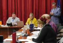 $918,180 American Rescue consulting contract amendment before Luzerne County Council
Luzerne County Council members Joanna Bryn Smith and Harry Haas, in foreground, review paperwork during a break in the March 24 meeting in which an American Rescue Plan Act consultant contract was discussed. Shown in the background, from left, are Council Chairman Jimmy Sabatino, council Clerk Sharon Lawrence and Chief Solicitor Harry W. Skene.
Jennifer Learn-Andes | Times Leader