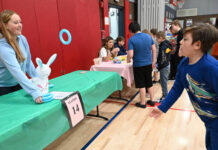 Pittston Area Intermediate Center holds Bunny Olympics
Pittston Area High School senior Taylor Stephenson, left, watches as third grader Lee Hamm participates in the Bunny Toss during Pittston Area Intermediate Centers Bunny Olympics.
Tony Callaio | For Sunday Dispatch