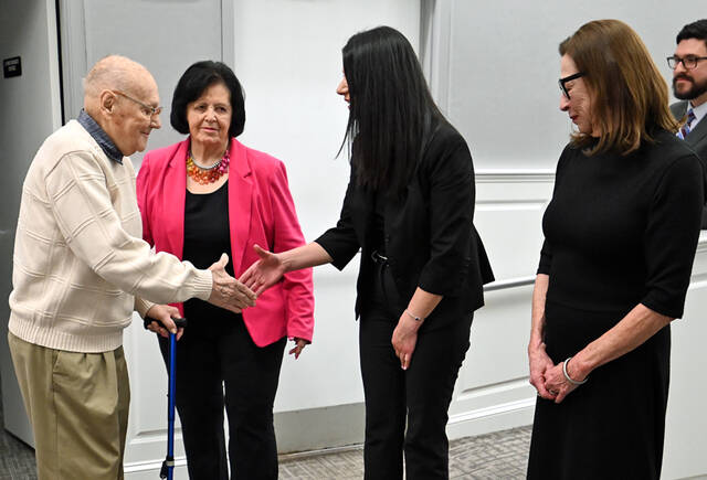 <p>Retired West Pittston tax collector, George Miller, is congratulated by council members, from left, Toni Valenti, Arianne Pupali, and Ellen Quinn.</p>
<p>Tony Callaio | For Sunday Dispatch</p>